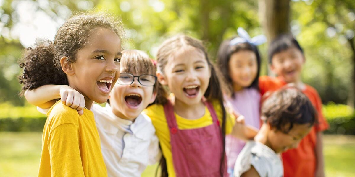 A group of children smiling